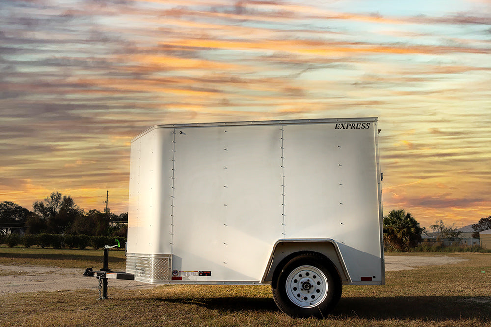 Small White Enclosed Trailer - Main Street Mower | Winter Garden, Ocala, Clermont