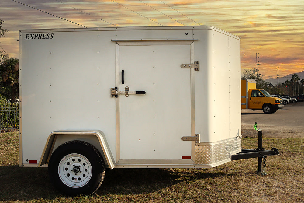 Small White Enclosed Trailer - Main Street Mower | Winter Garden, Ocala, Clermont