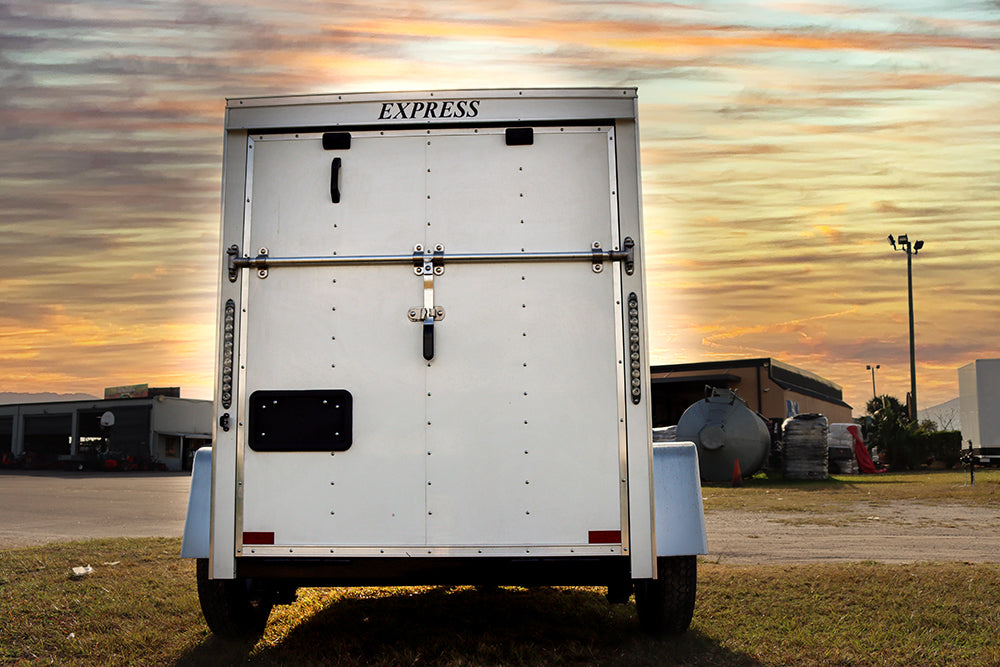 Small White Enclosed Trailer - Main Street Mower | Winter Garden, Ocala, Clermont